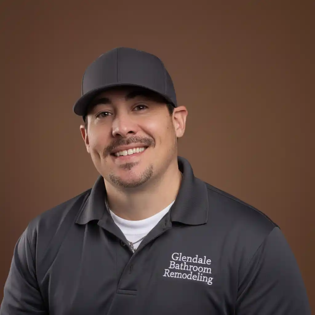 Walter King, owner of Glendale Bathroom Remodeling, wearing company branded shirt